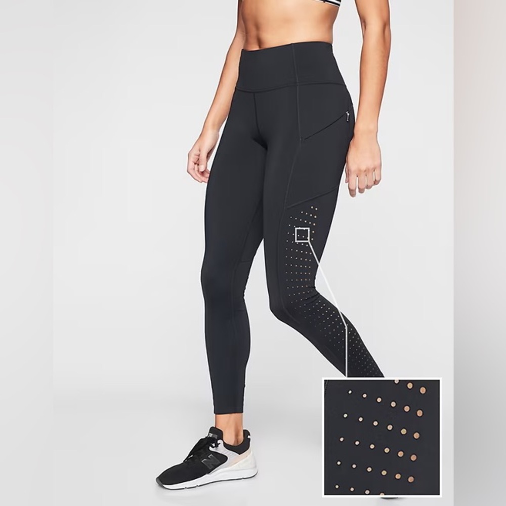 Athleta Contender laser cut zipper side pocket tights size xs like new